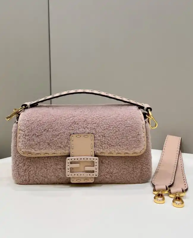 Embrace elegance with the Fendi Baguette in soft pink wool. A timeless treasure for your collection! 🌸✨💖 https://tinyurl.com/2y2qblfr