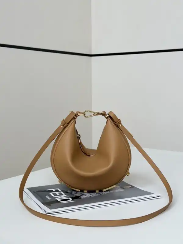 Discover elegance with the Fendi Fendigraphy Small Brown. A perfect blend of style and sophistication, it’s a lovely addition to your collection! 🍂💖✨ https://tinyurl.com/2aqqvfgb