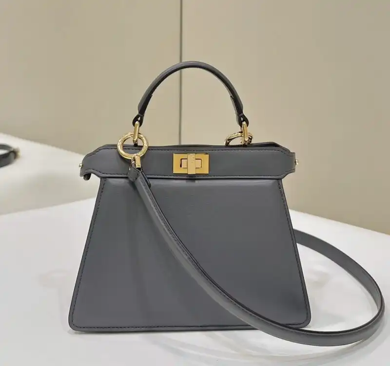 Discover the charm of the Fendi Peekaboo Mini in soft grey. A perfect blend of elegance and versatility for your collection. 👜✨💖 https://tinyurl.com/2c3r7tvq