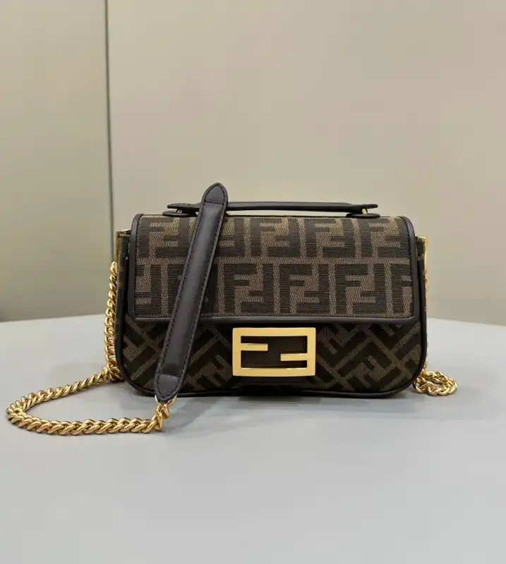 Elevate your style with the Fendi Baguette Sliding Chain. 🌟 A timeless brown beauty that adds elegance to any outfit. 👜✨ https://tinyurl.com/2btl66dh