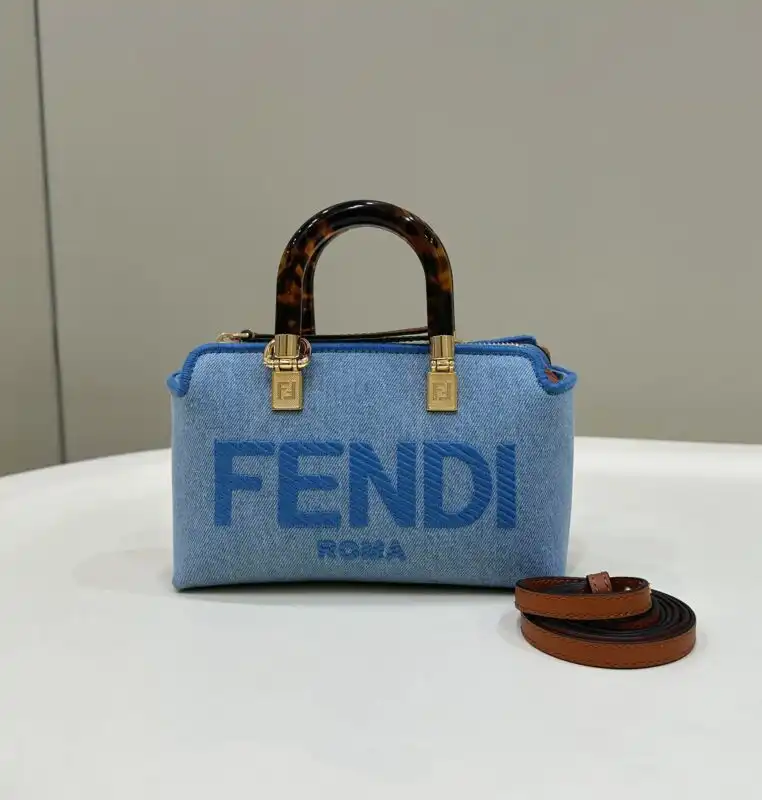 Discover elegance with the Fendi By The Way Boston in soft blue cotton. A perfect blend of style and comfort! 🌟💙👜 https://tinyurl.com/2aacrv58