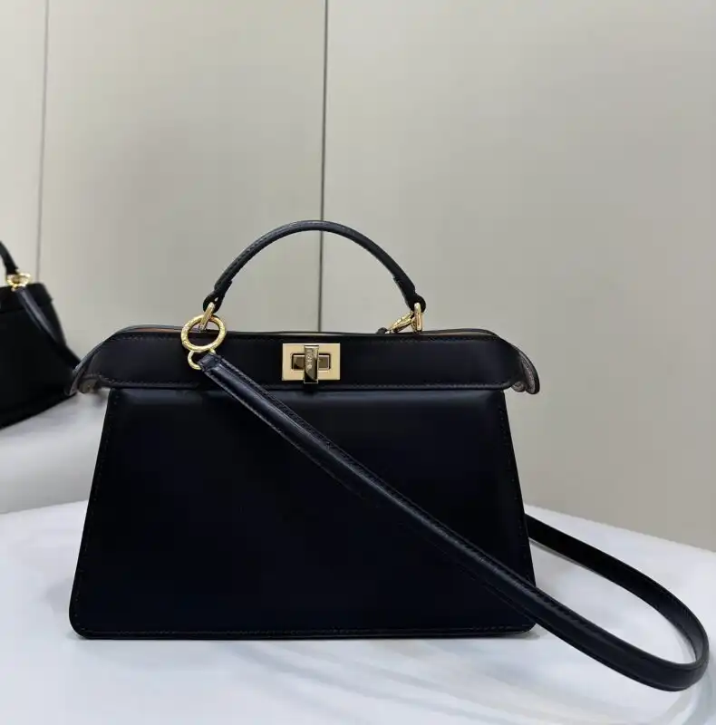 Discover the elegance of the Fendi Peekaboo Large in classic black. Timeless style meets gentle sophistication. 🌟🖤✨ Perfect for every occasion! https://tinyurl.com/2ax32tbg
