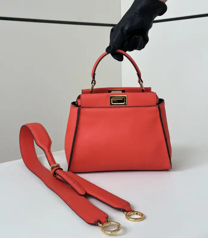 Discover the elegant Fendi Peekaboo in a stunning medium red. A timeless piece that adds charm to any outfit! ❤️✨👜 https://tinyurl.com/22t6sedb