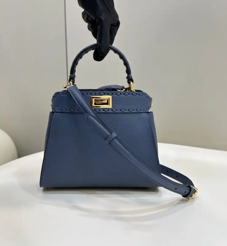Discover the elegance of the Fendi Peekaboo Small in serene blue. Perfect for adding a touch of charm to any outfit! 💙✨👜 https://tinyurl.com/2cggxjkk