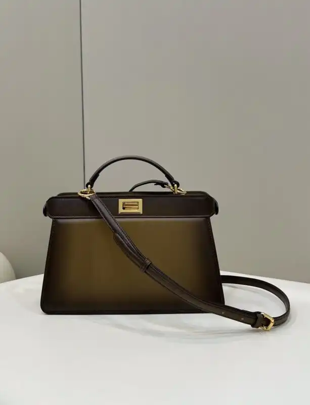 Discover the elegance of the Fendi Peekaboo Large in rich dark brown. A timeless companion for your stylish adventures! 👜✨💖 https://tinyurl.com/2xo6576n