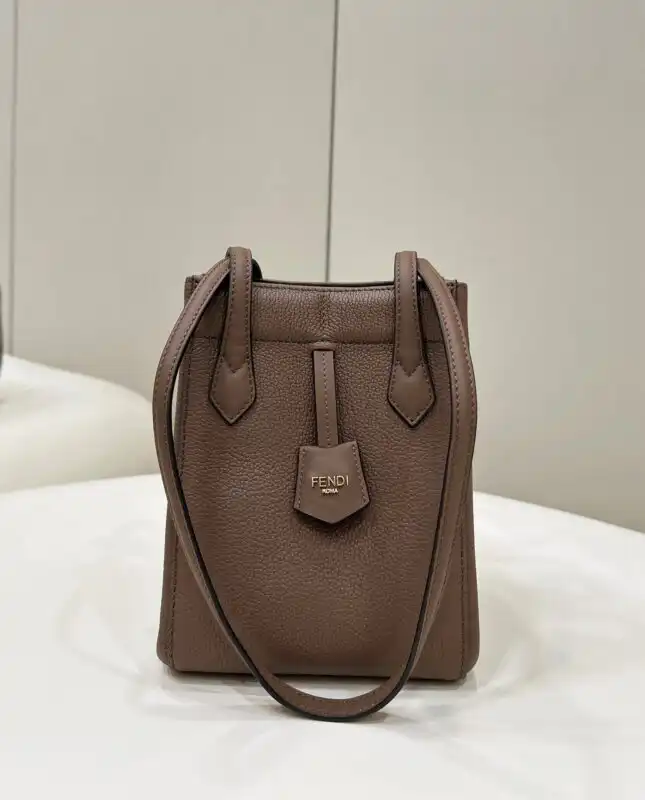 Discover the elegance of the Fendi Origami Small in a lovely brown hue. A perfect blend of style and charm! 🌟💖✨ https://tinyurl.com/25h7zxea