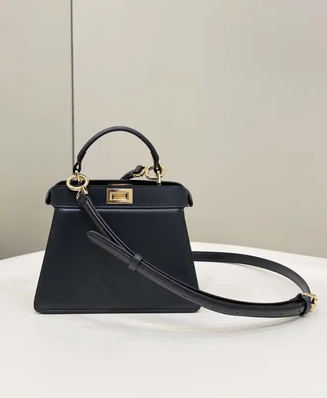 Discover the elegance of the Fendi Peekaboo Mini in classic black. A timeless companion for any occasion, just for you! 🖤✨👜 https://tinyurl.com/2c2rhadm
