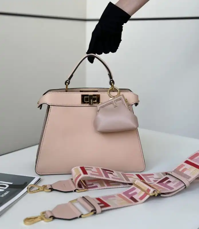 Discover the charm of the Fendi Peekaboo Medium in soft pink. A perfect blend of elegance and playfulness! 💖✨👜 https://tinyurl.com/29dmgaxy