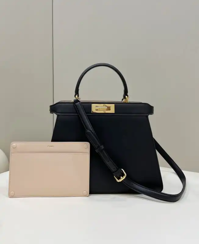 Discover the elegance of the Fendi Peekaboo Medium in classic black. A timeless companion for every occasion. 🖤✨🥰 https://tinyurl.com/2acs5wqm