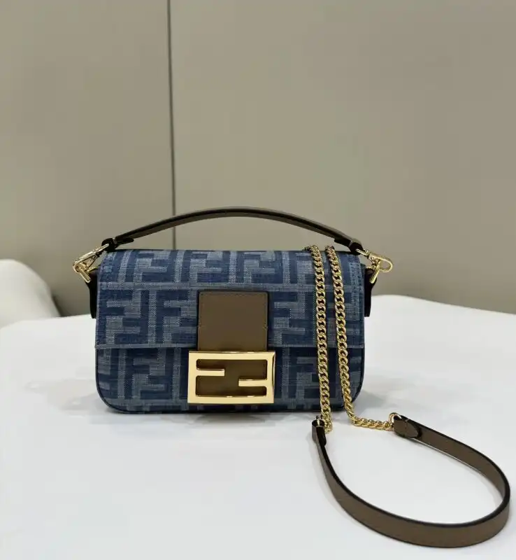 Embrace timeless elegance with the Fendi Baguette Small in dark blue denim. 🌟 A perfect blend of style and charm! 💖✨ https://tinyurl.com/2c72d97l