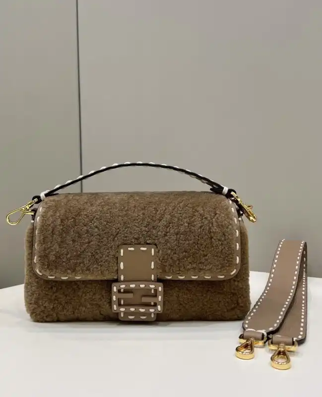 Discover the timeless elegance of the Fendi Baguette in warm brown wool. Perfect for any occasion, it’s a gentle touch of luxury. 👜✨💖 https://tinyurl.com/2blytthr
