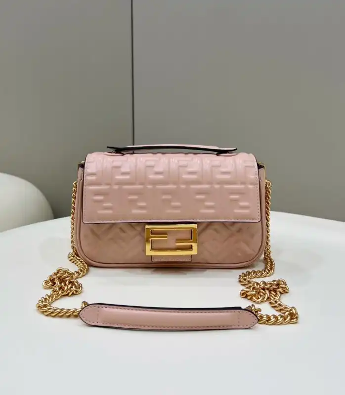 Discover the elegance of the Fendi Baguette Sliding Chain in soft pink. A perfect blend of style and charm. 👜💖✨ https://tinyurl.com/28de9boo
