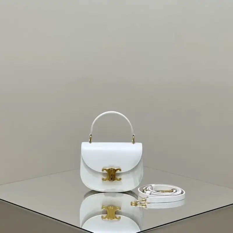 Discover the elegance of the Celine Mini Triomphe in pristine white. A timeless piece that radiates beauty and grace. ✨🤍👜 https://tinyurl.com/286z7ak2