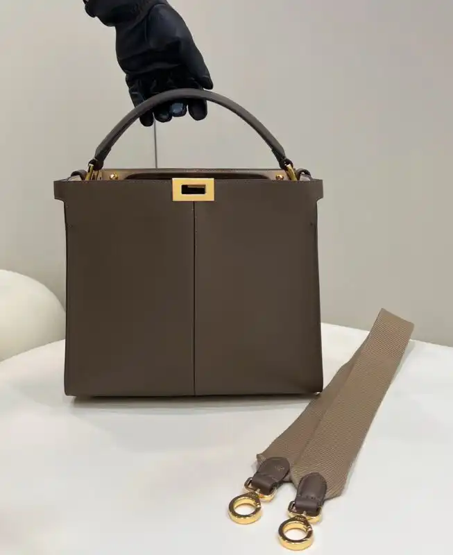 Discover the enchanting Fendi Peekaboo X Lite in warm brown. A perfect blend of elegance and charm for your collection! 🌟🤎✨ https://tinyurl.com/24x3rc6j