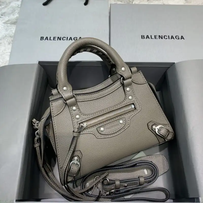 Discover the elegance of the Balenciaga Neo Classic City in Stone Grey. A timeless companion for your stylish journey. 💖👜✨ https://tinyurl.com/2672h9uw