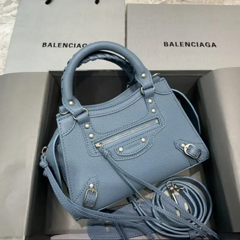 Introducing the Balenciaga Neo Classic City in a soothing blue hue. Elevate your style with elegance and grace. 💙✨👜 https://tinyurl.com/2xpbrna7