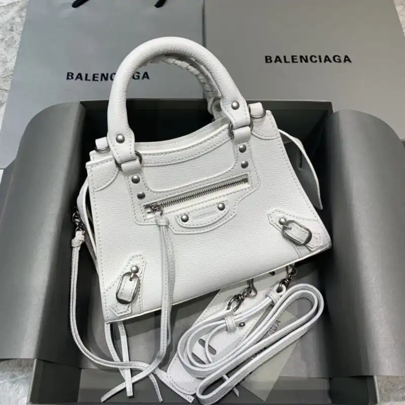 Discover the elegance of the Balenciaga Neo Classic City in white, where style meets sophistication. Perfect for any occasion! ✨👜💕 https://tinyurl.com/2522wgsz