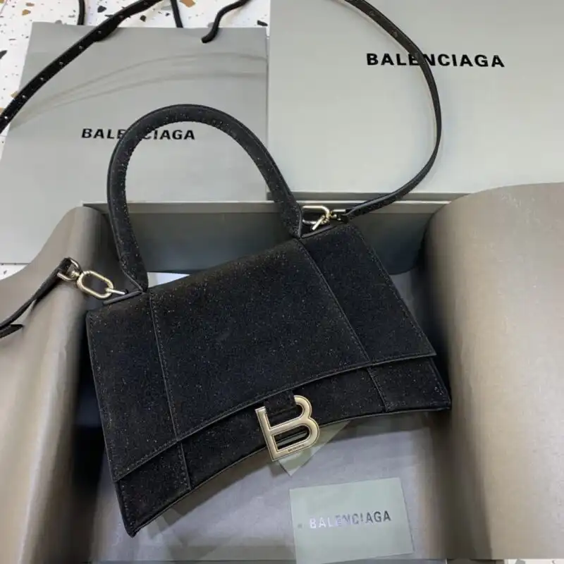 Introducing the Balenciaga Hourglass in Shine Black✨—a perfect blend of elegance and sophistication for your everyday style. Embrace your unique charm! 💖👜 https://tinyurl.com/27b7dbou