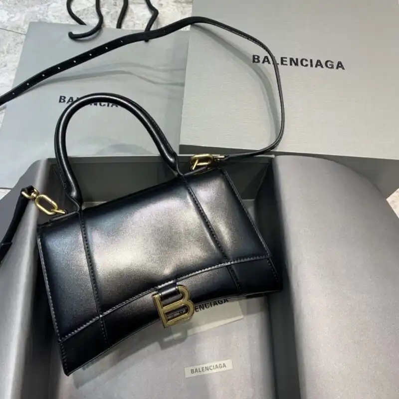 Discover the elegance of the Balenciaga Hourglass Black bag—a timeless piece that beautifully complements your style. 🖤✨ Perfect for every occasion! https://tinyurl.com/2yh7p579