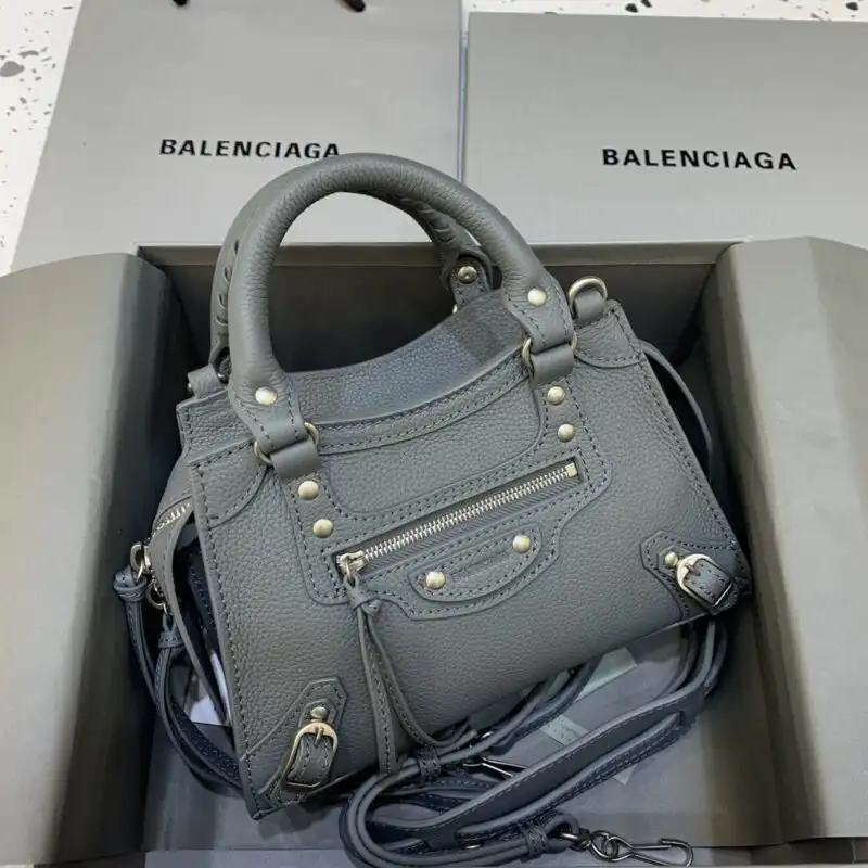 Discover the elegance of the Balenciaga Neo Classic City in soft grey. A timeless piece to elevate your style effortlessly. ✨👜💖 https://tinyurl.com/27o9upv9