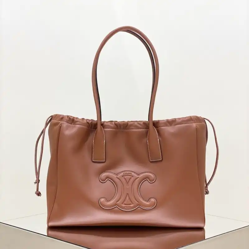 Discover the Celine Cubas Tote in rich brown—a perfect blend of elegance and warmth. 🌟✨ Carry beauty with you, always! 👜💖 https://tinyurl.com/23ez3h88