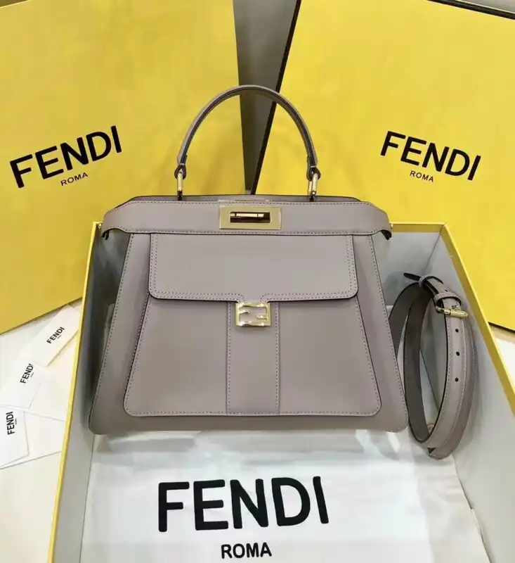 Discover elegance with the Fendi Peekaboo in soft beige. Its charming patch pocket adds a delightful touch to your style! 💖✨👜 https://tinyurl.com/2dy4qlnf