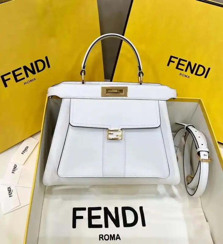 Discover the elegance of the Fendi Peekaboo with Patch Pocket in timeless white. A perfect companion for your daily adventures! 🌼💖✨ https://tinyurl.com/22ad3hm4