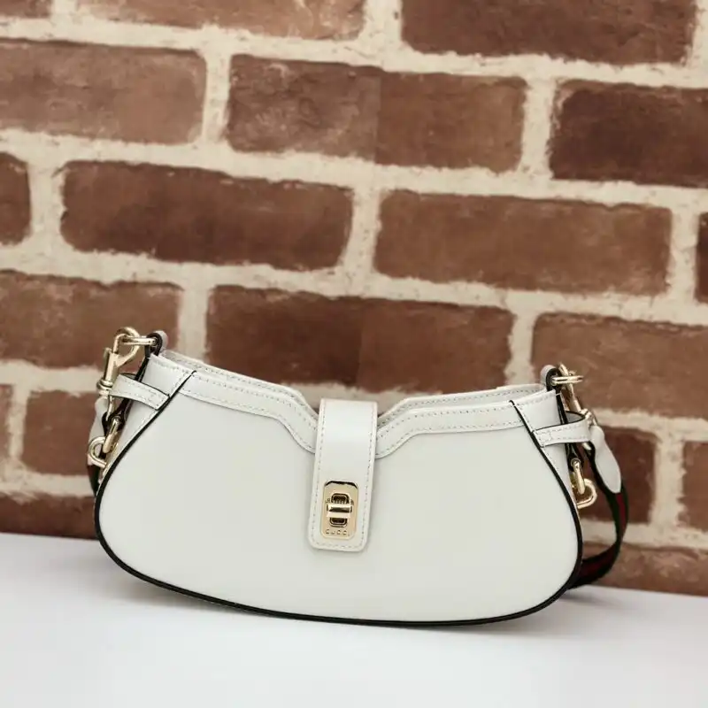 Embrace elegance with the Gucci Moon Side White. A perfect blend of style and comfort, it’s your new favorite companion. 🌙✨👜 https://tinyurl.com/23wcw72f