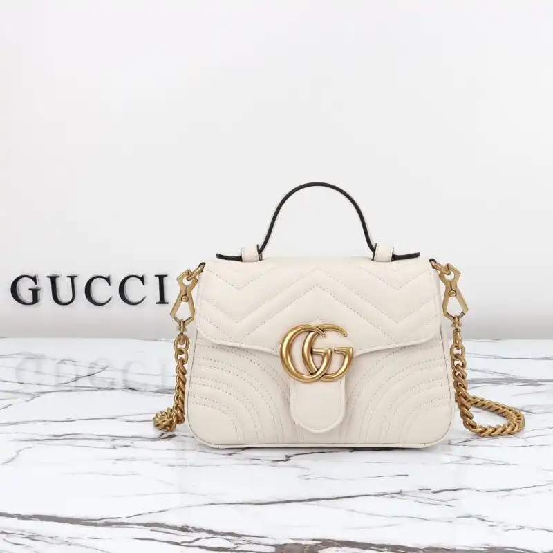 Embrace elegance with the Gucci GG Marmont Top Handle. Its timeless design and soft hue make every moment special. ✨🤍👜 https://tinyurl.com/2dq2n5bn