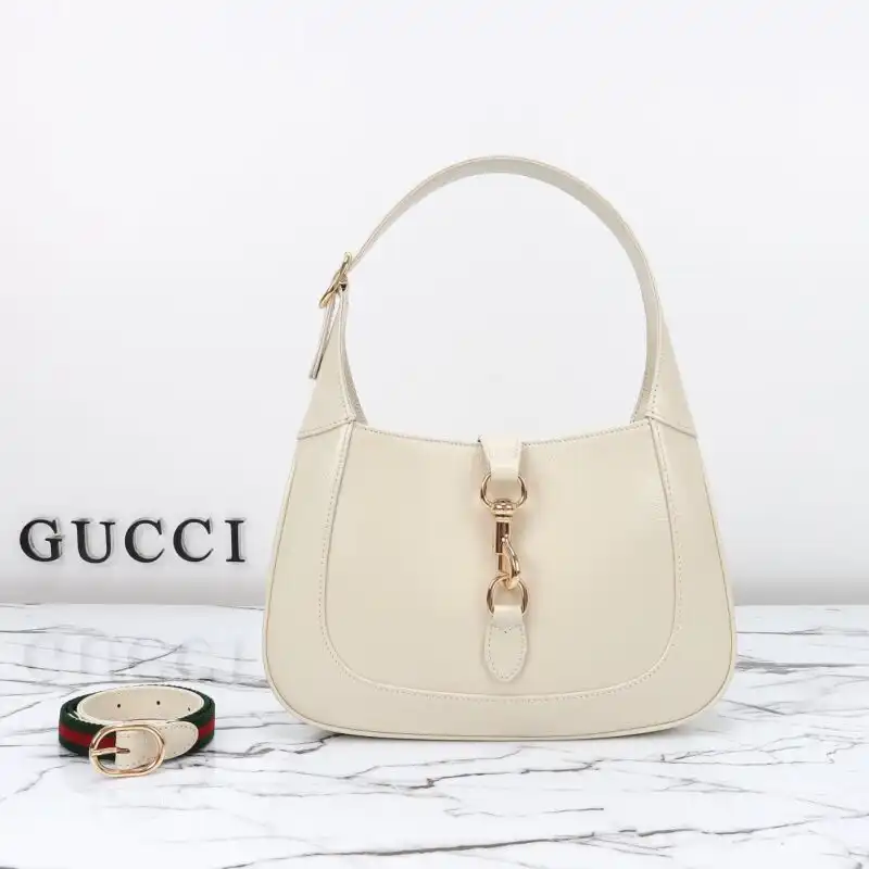 Discover the elegance of the Gucci G Jackie Small in Patent White. A timeless piece that adds a touch of luxury to your style. ✨👜💖 https://tinyurl.com/2xmtwwf5