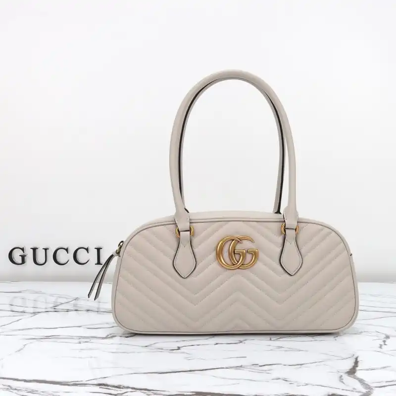 Elevate your style with the Gucci Marmont Small Top Handle in soft white. A timeless accessory that adds elegance to any outfit! ✨👜💕 https://tinyurl.com/29q5yzvd