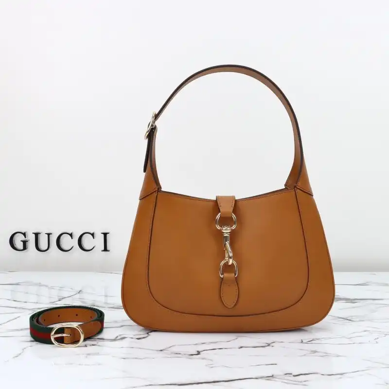 Discover the elegance of the Gucci G Jackie Small in rich brown patent. A timeless piece to elevate your style effortlessly. 🌟👜✨ https://tinyurl.com/222q5jvz