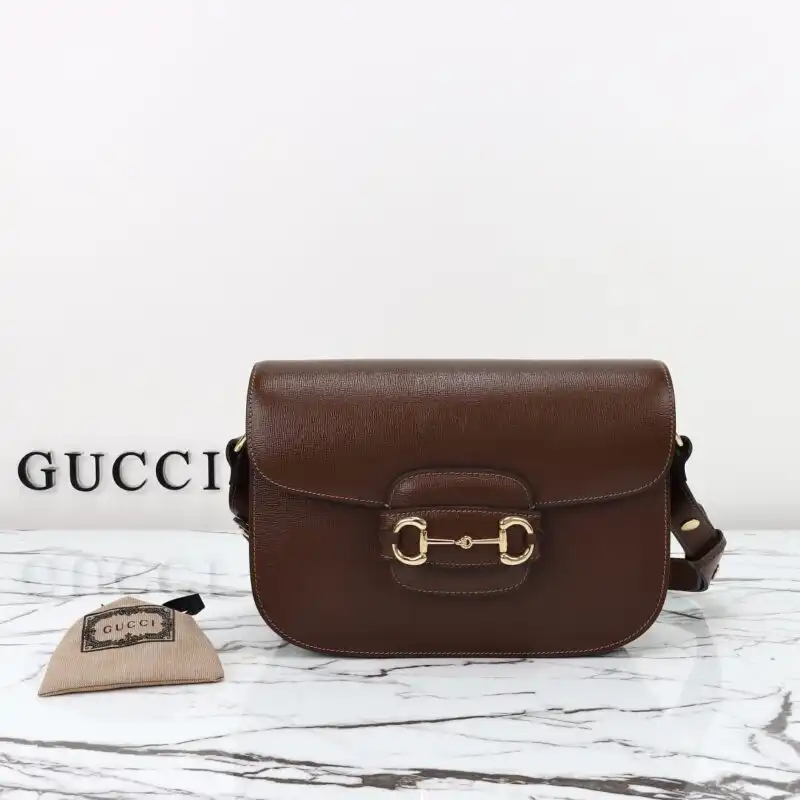 Discover the elegance of the Gucci G 1955 Horsebit in a warm brown hue. A timeless piece for your collection! 👜✨💖 https://tinyurl.com/26cgjc24