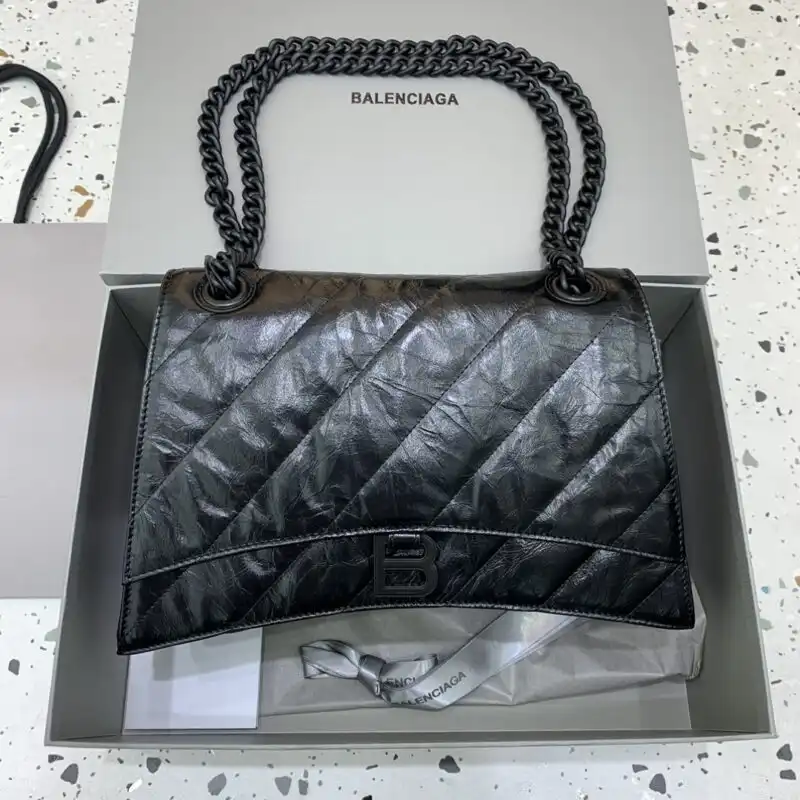 Discover the elegance of the Balenciaga Crush Large in timeless black. A perfect blend of style and sophistication awaits you! 🖤✨ https://tinyurl.com/2ahshn9v