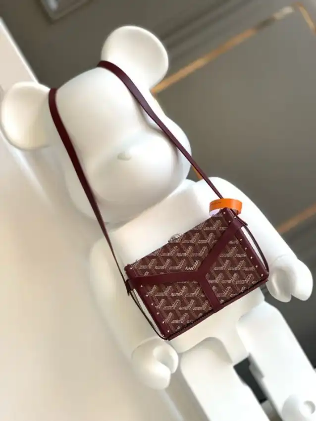 Discover the elegance of the Goyard Minaudière Trunk Bag in Bordeaux. Perfect for your essentials, it adds a touch of charm! ❤️✨👜 https://tinyurl.com/2cpqthbf