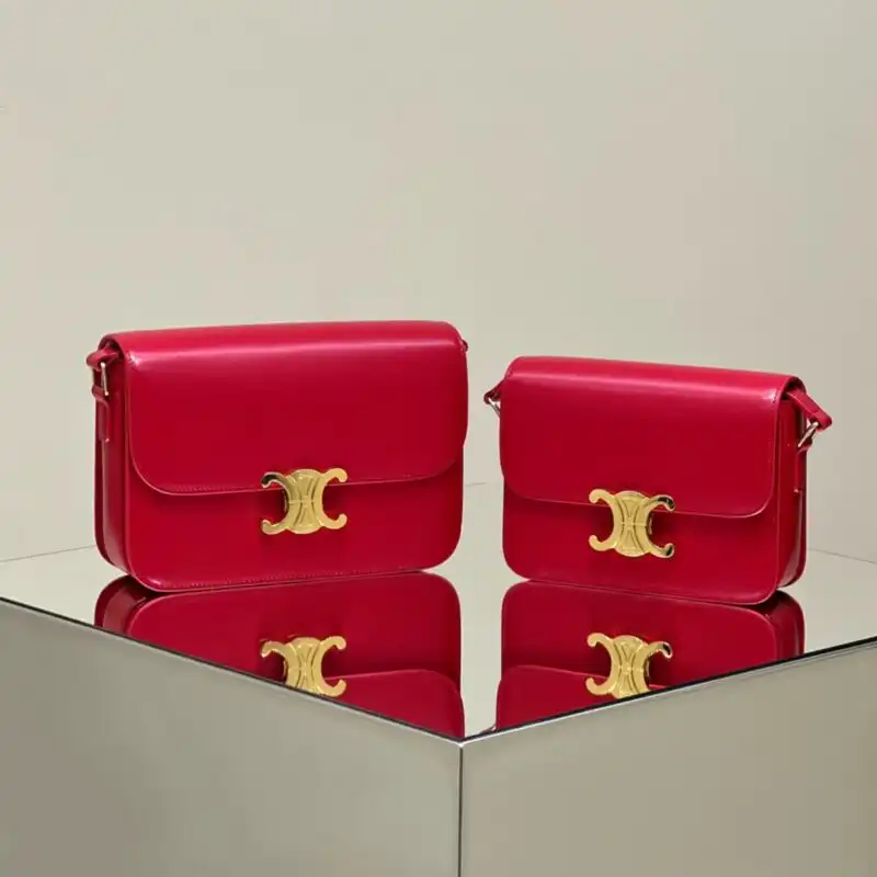 Discover the elegance of the Celine Triomphe Mini in radiant red. A perfect blend of style and grace awaits you! ❤️✨ https://tinyurl.com/2832d8lg