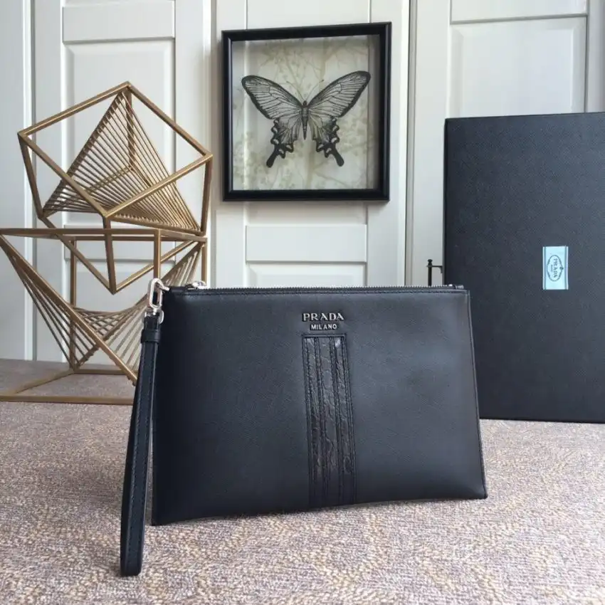 Discover elegance with the Prada Large Pouch in timeless black. Perfect for any occasion, it adds a touch of luxury to your style. 🖤✨👜 https://tinyurl.com/2d7rt8e5