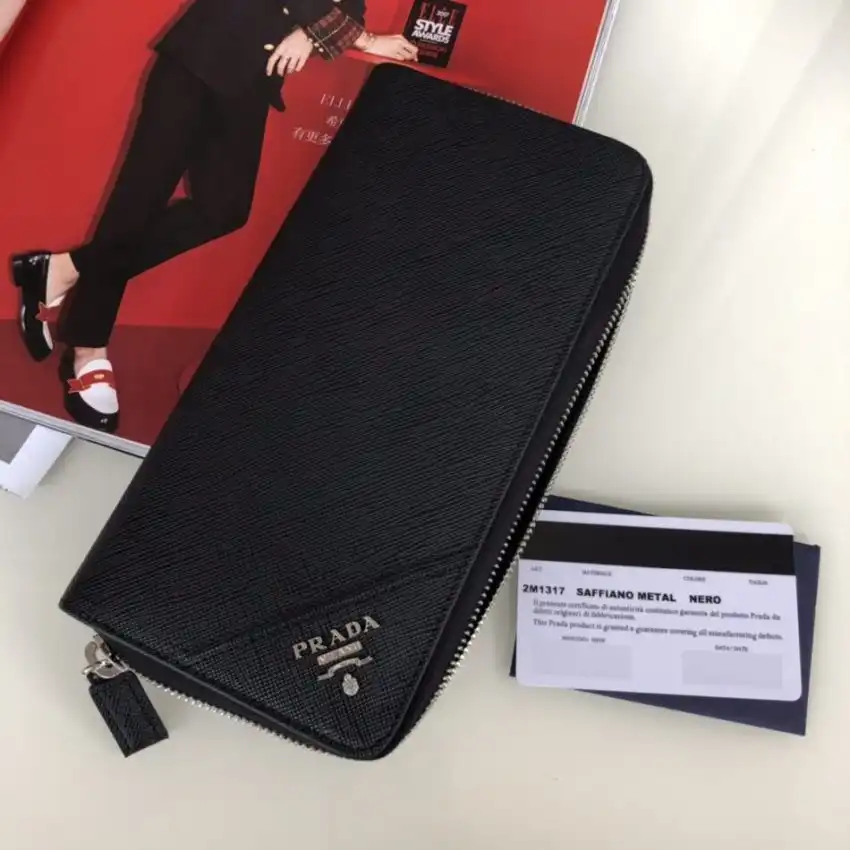 Discover elegance with the Prada Saffiano Long Wallet in Black and Silver. A perfect blend of style and functionality. 🖤✨💖 https://tinyurl.com/27n3pvxe