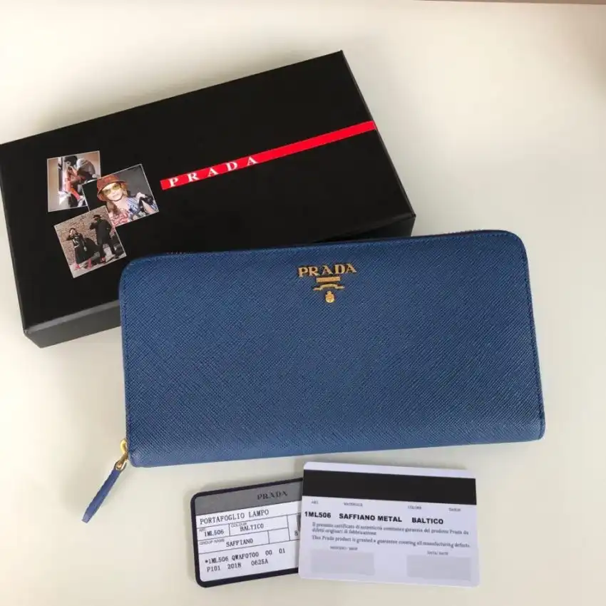 Discover the elegance of the Prada Saffiano Long Zipper Wallet in soothing blue. Perfect for organizing your essentials with style. 💙✨👜 https://tinyurl.com/2baseg4k