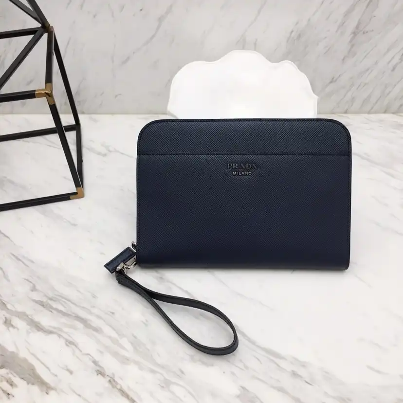 Discover the elegance of the Prada Saffiano New Pouch—your perfect companion for style and grace. ✨💖👜 #TimelessBeauty https://tinyurl.com/2betvcw6