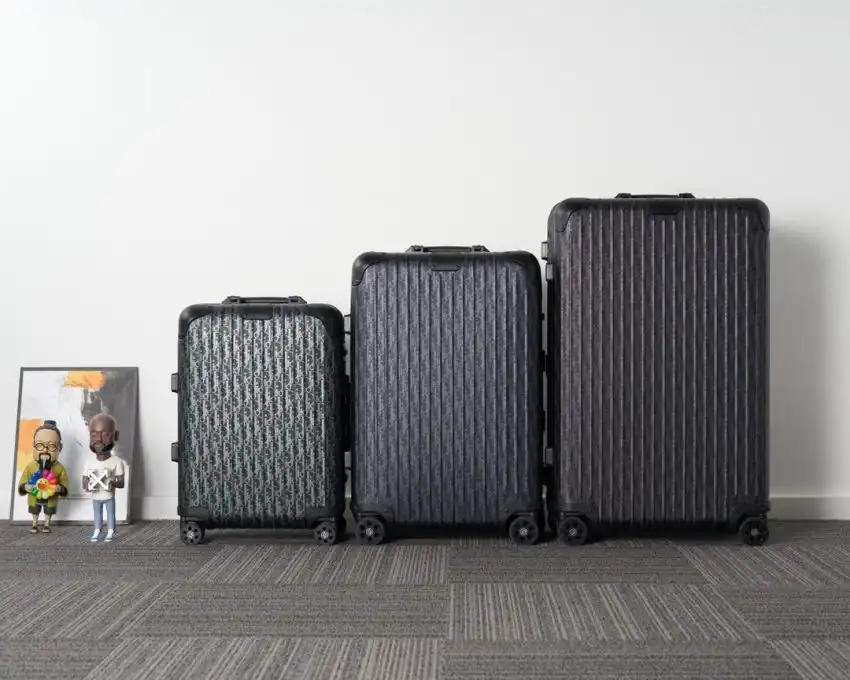 Discover the elegance of the Rimowa & Dior suitcase in timeless black. Travel in style and make every journey unforgettable. ✈️🖤✨ https://tinyurl.com/26eev59o
