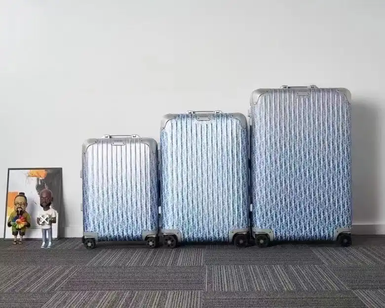 Discover the elegance of the Rimowa & Dior Light Blue Suitcase 🌟✨ Travel in style and grace wherever your adventures take you! 🧳💙 https://tinyurl.com/275aou3o