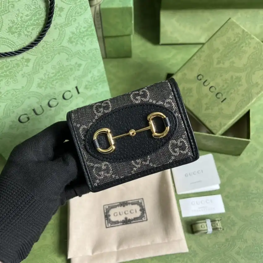 Discover elegance with the Gucci Horsebit 1955 Wallet in classic black. A timeless piece to cherish and adore. 🖤✨🌟 https://tinyurl.com/22fmgm7j