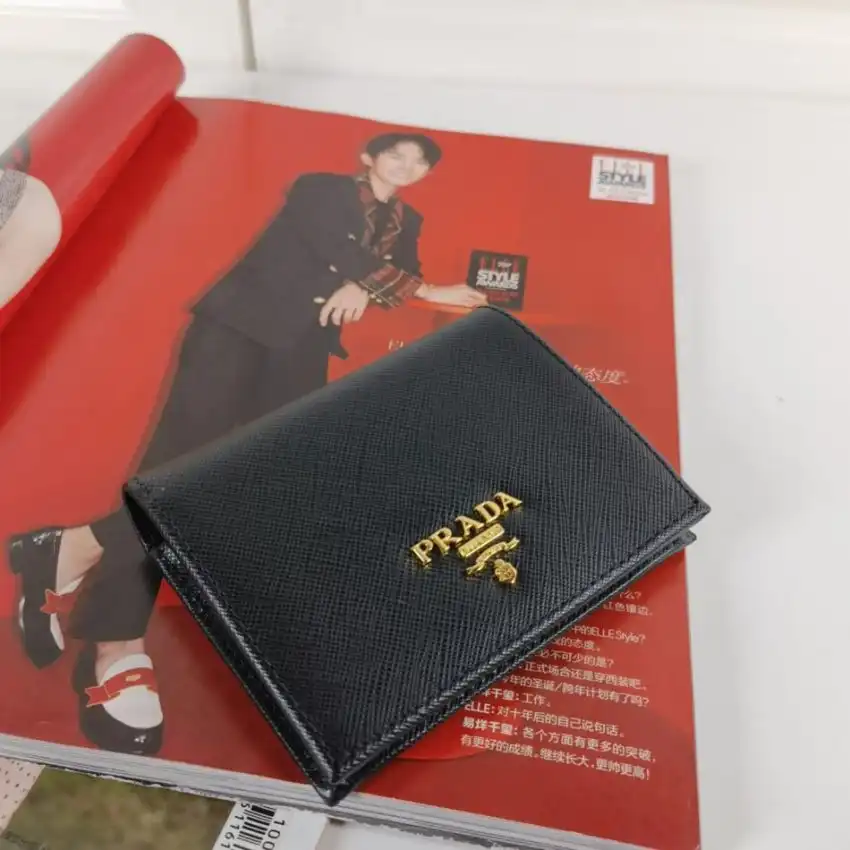 Discover elegance with the Prada Saffiano Two Fold Wallet, a perfect blend of style and functionality, crafted just for you. ✨💖👜 https://tinyurl.com/2dzynadp
