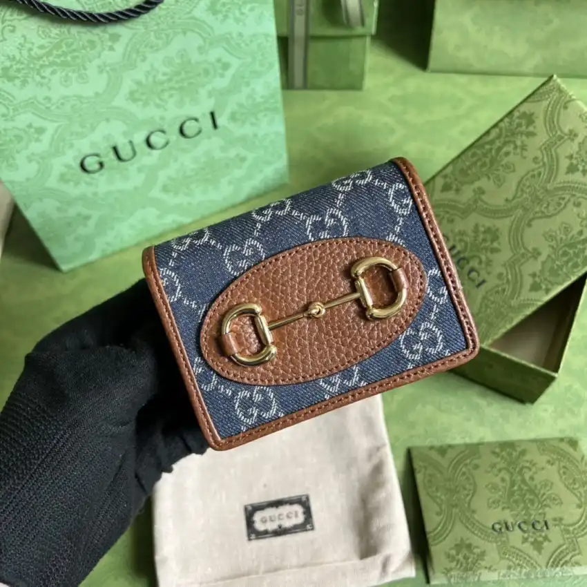 Discover the timeless elegance of the Gucci Horsebit 1955 Wallet in Denim Blue. Perfect for any occasion! 🌟💙✨ https://tinyurl.com/256e2vqj