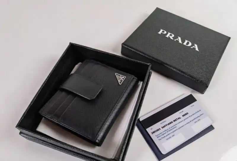 Discover elegance with the Prada Saffiano Two Fold Compact Wallet. Perfectly crafted to hold your treasures with love. 💖✨👜 https://tinyurl.com/22wnrfqa