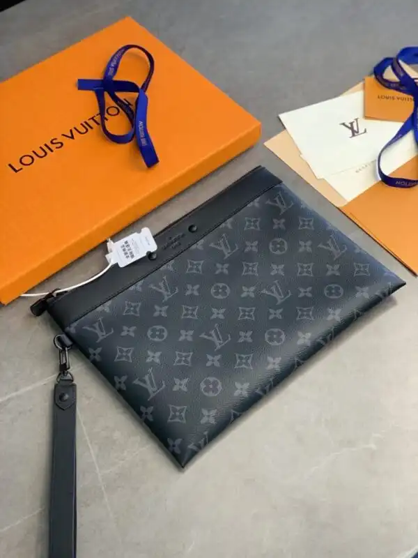 Discover the elegance of the Louis Vuitton To Go Pochette in black—a perfect blend of style and practicality. ✨👜💖 https://tinyurl.com/29dyufv4
