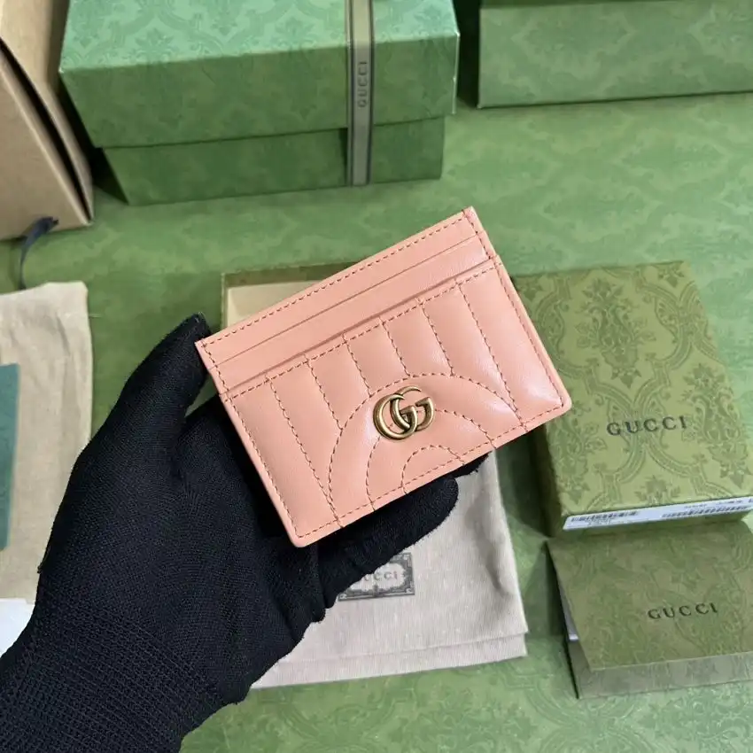 Elevate your style with the enchanting Gucci Marmont Card Holder in pink. A perfect blend of elegance and charm! 💖✨🌷 https://tinyurl.com/2444w5d9