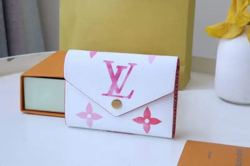 Discover the elegance of the Louis Vuitton Victorine Wallet in white and pink. Perfect for adding a touch of luxury to your day! 💖✨👜 https://tinyurl.com/2bmty52y