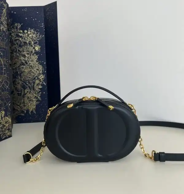 Elevate your style with the Dior Signature Top Handle in classic black. Timeless elegance awaits you! 🖤✨ #DiorLove https://tinyurl.com/2ddp3rvn